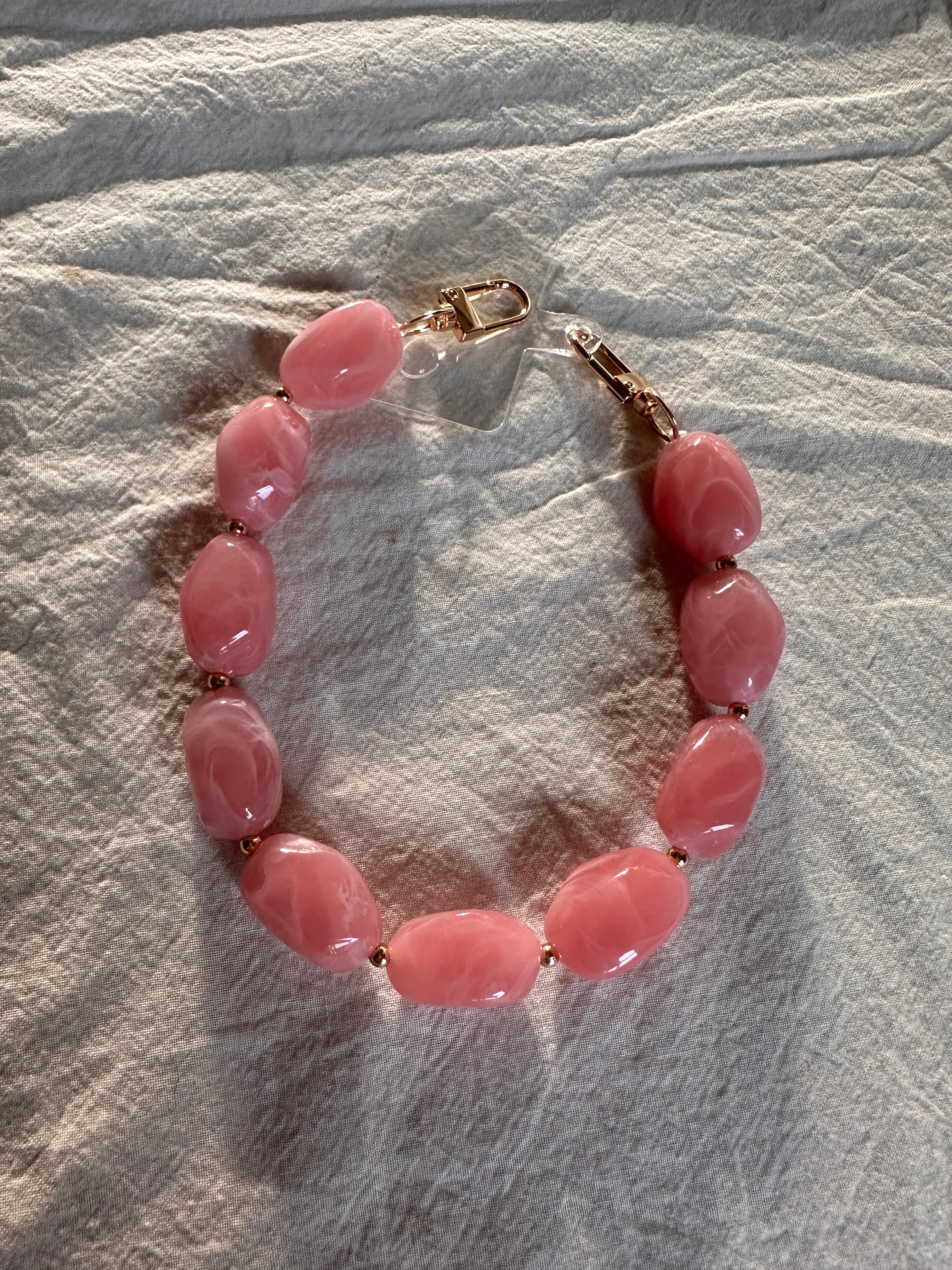 TELEFOONKOORDJE ROZE STENEN