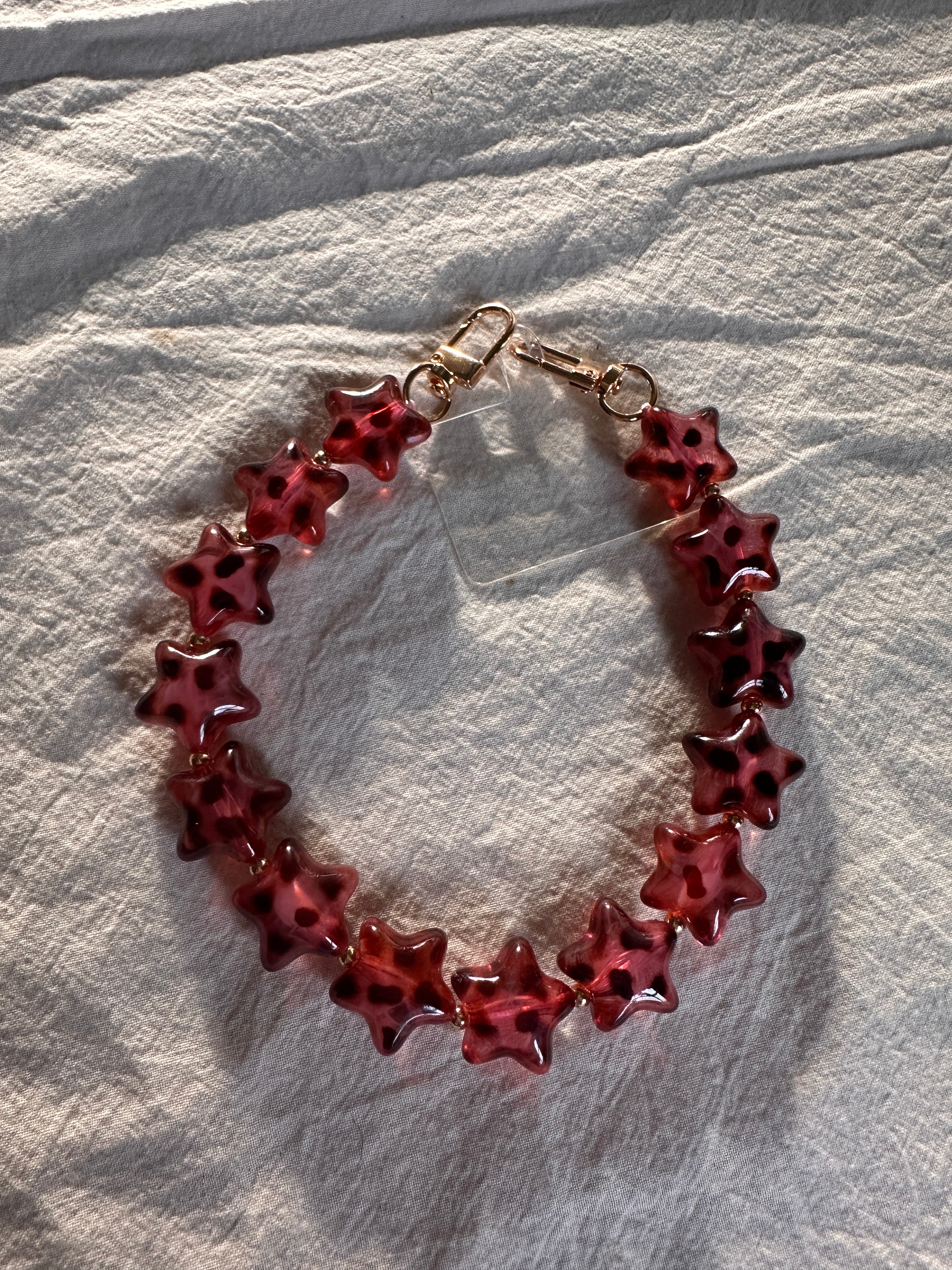 TELEFOONKOORDJE STERREN ROZE PANTER