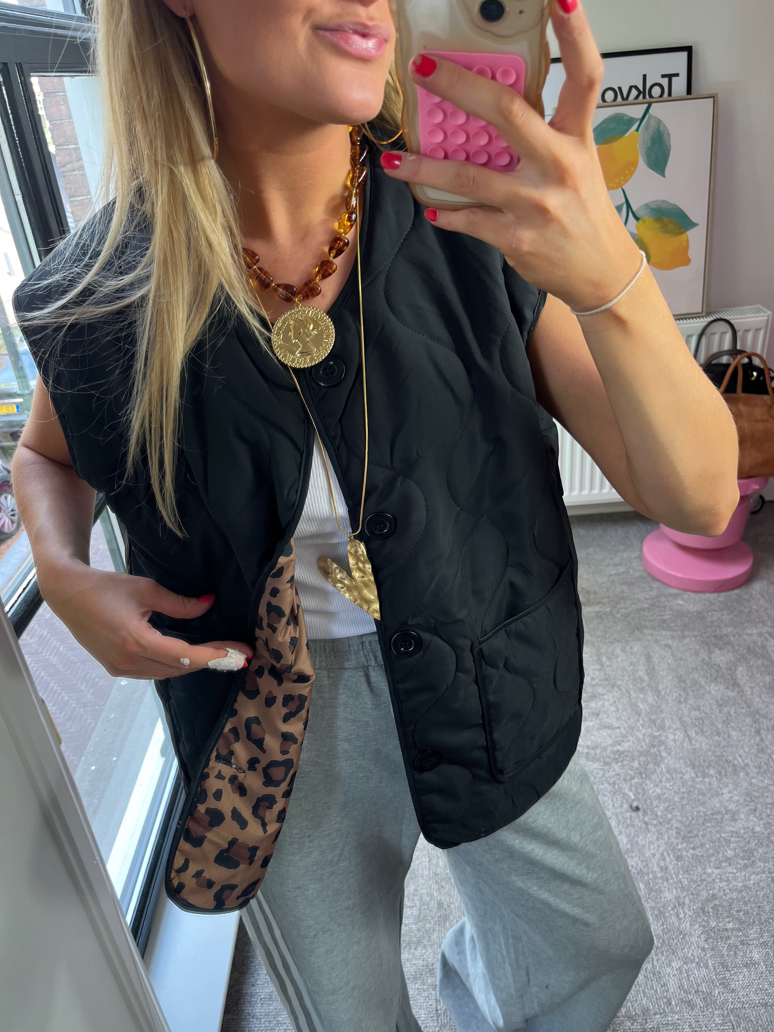 TESSY BODYWARMER MET PANTER