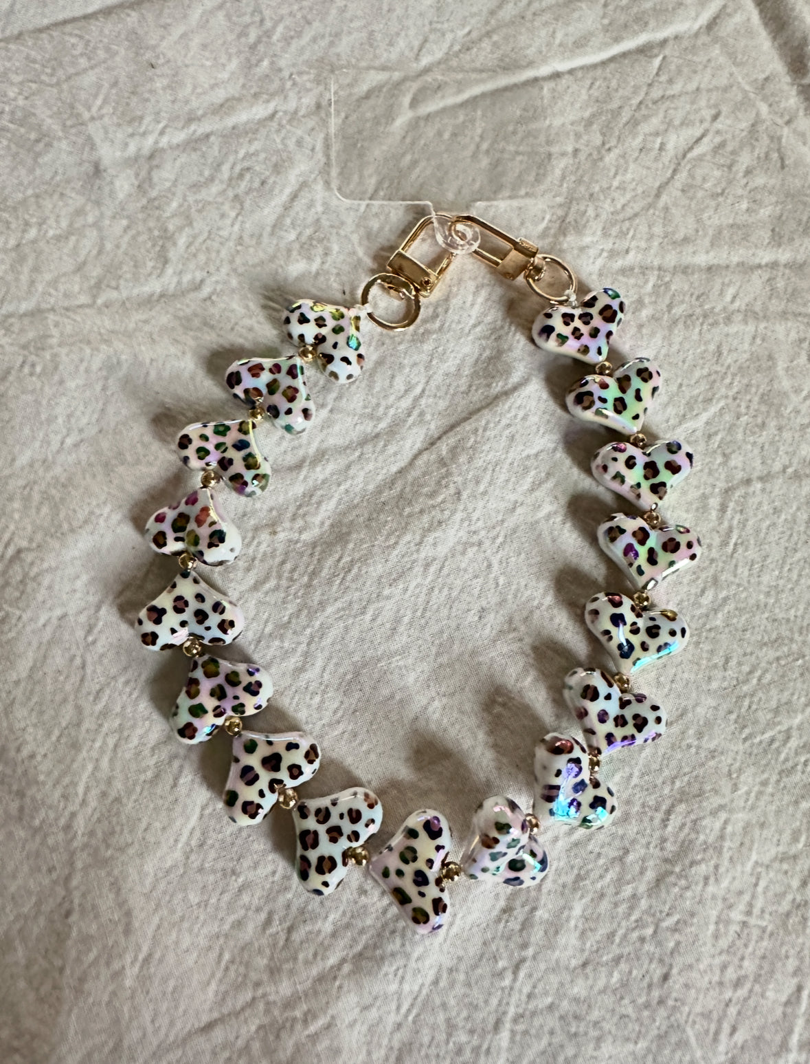 TELEFOONKOORDJE HARTJES PARELMOER PANTERPRINT