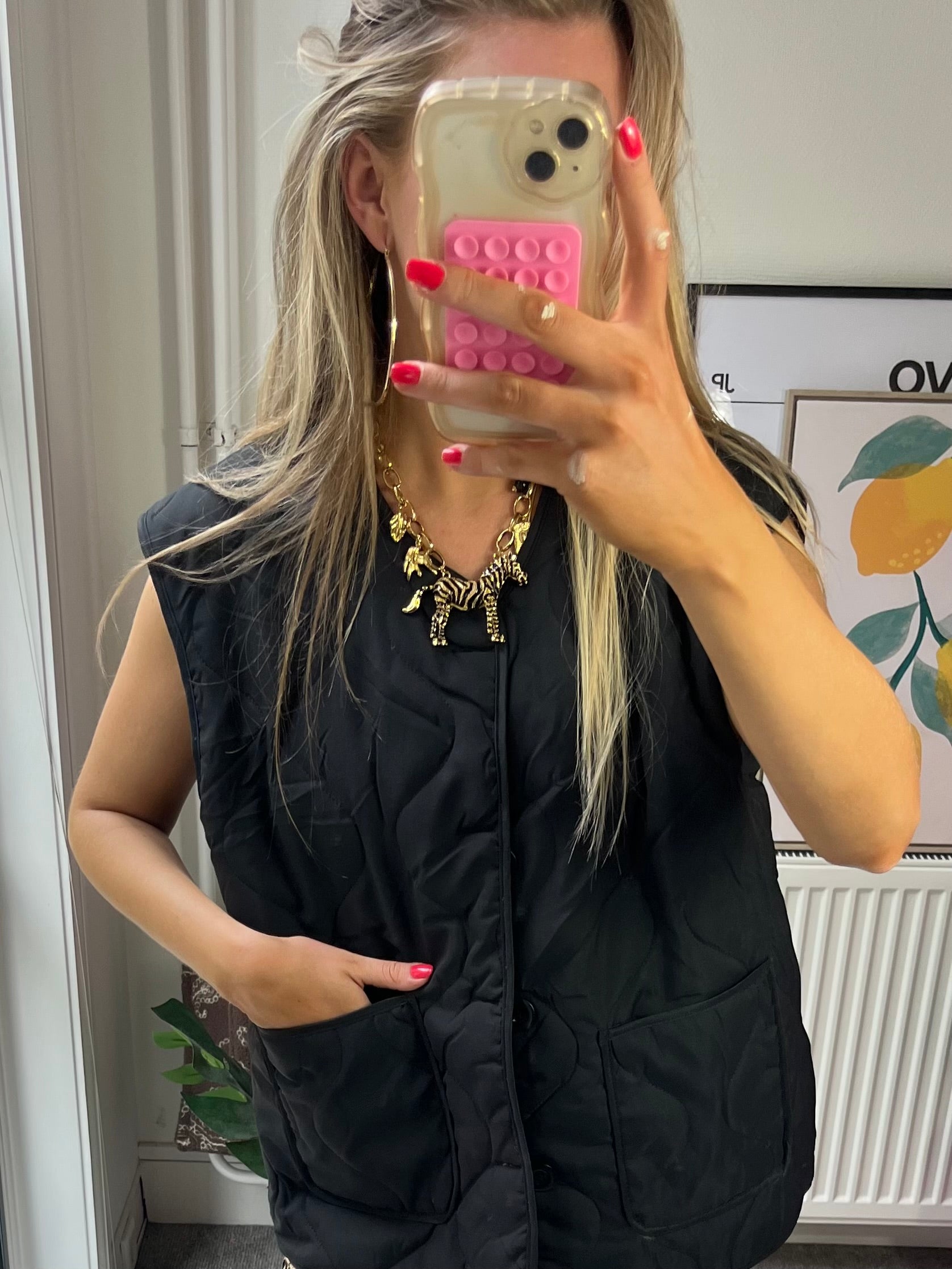 TESSY BODYWARMER MET PANTER